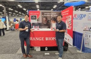 Orange Biomed team showcasing its A1C testing technology at the ADCES 2026 exhibition booth